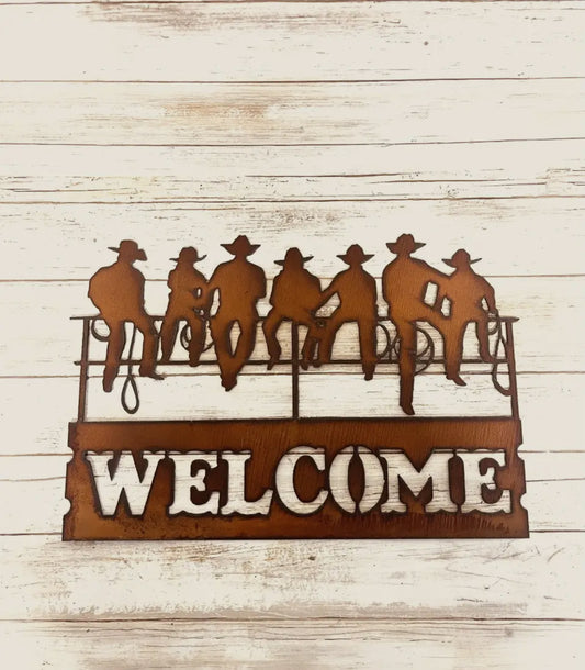 Cowboys on Fence Welcome Sign