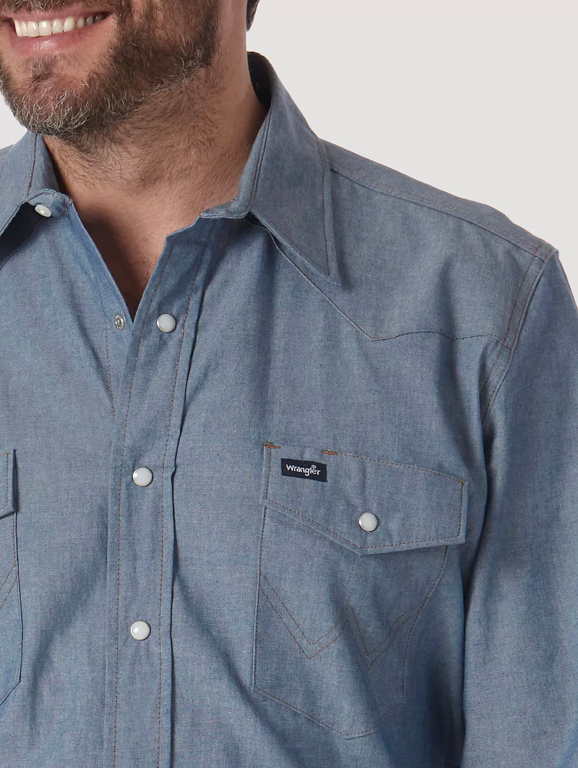 WRANGLER COWBOY CUT® FIRM FINISH LONG SLEEVE WESTERN SNAP SOLID WORK SHIRT IN CHAMBRAY BLUE